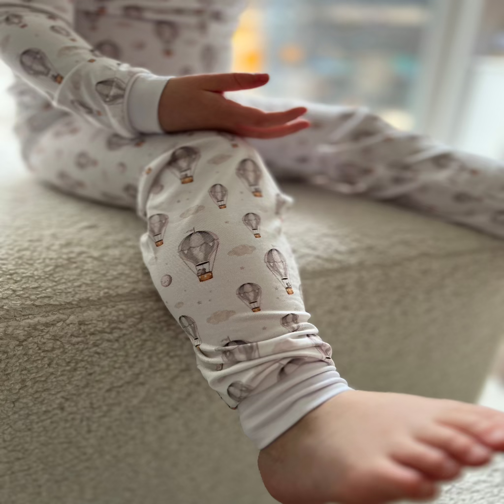 Cozy and breathable two-piece hot air balloon pajamas, perfect for toddlers and kids.
