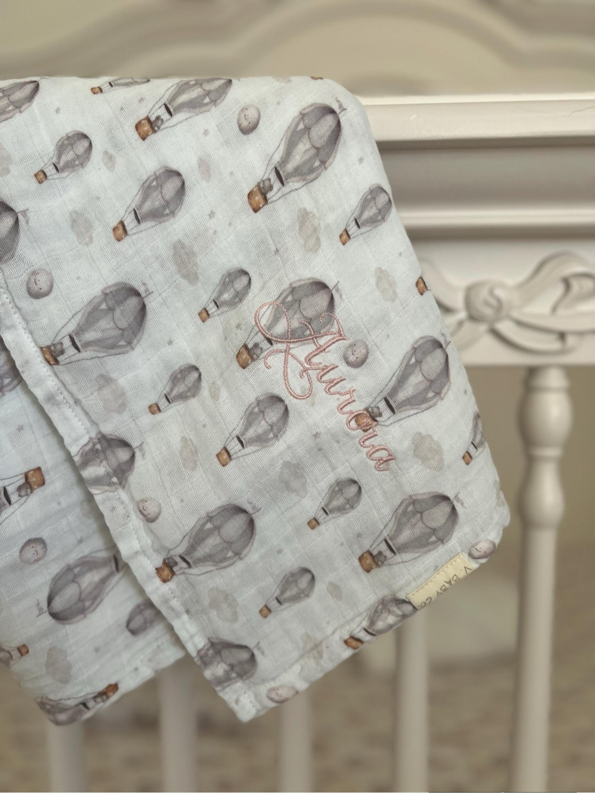 Personalized embroidery in progress for unique baby keepsakes at V. Baby Co.