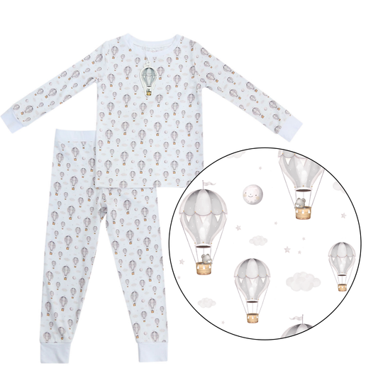 Adorable hot air balloon two-piece bamboo pajamas featuring soft beige and gray hues.